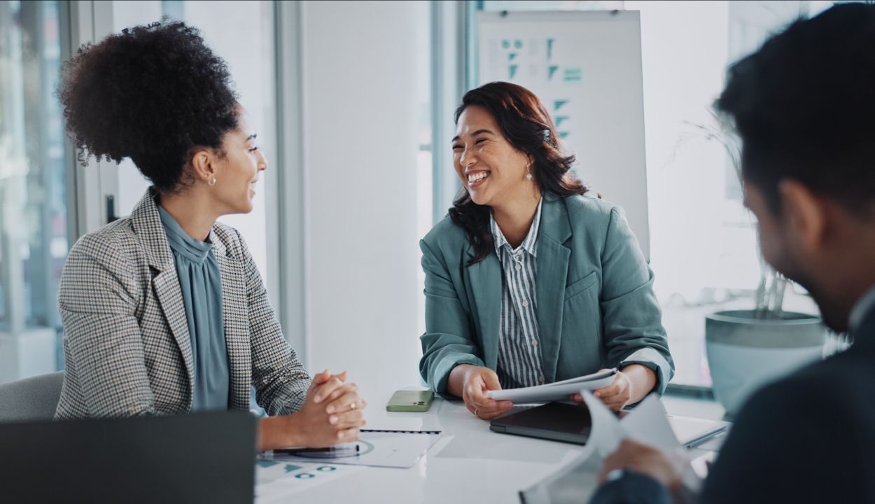 medical executives discussing finances around a table