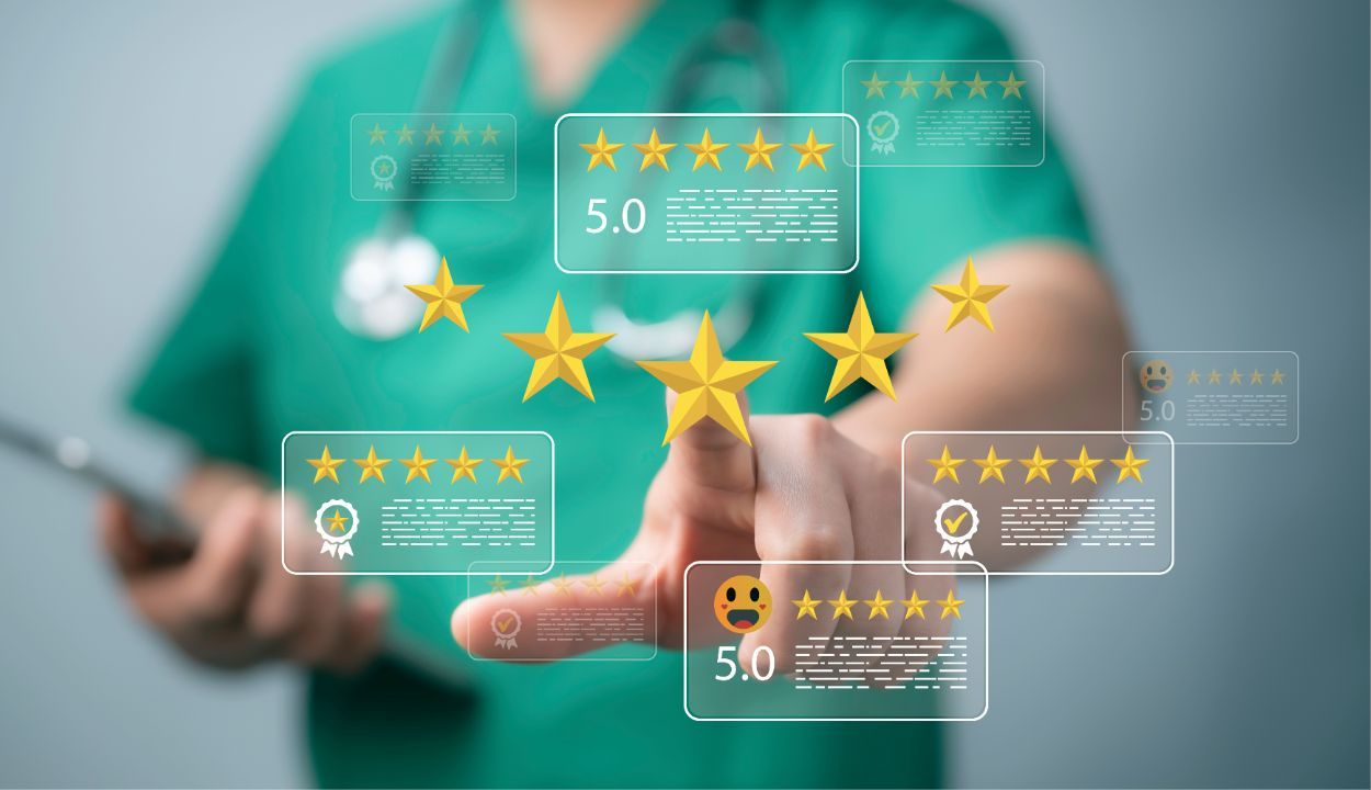 physician pointing to 5 star ratings graphics