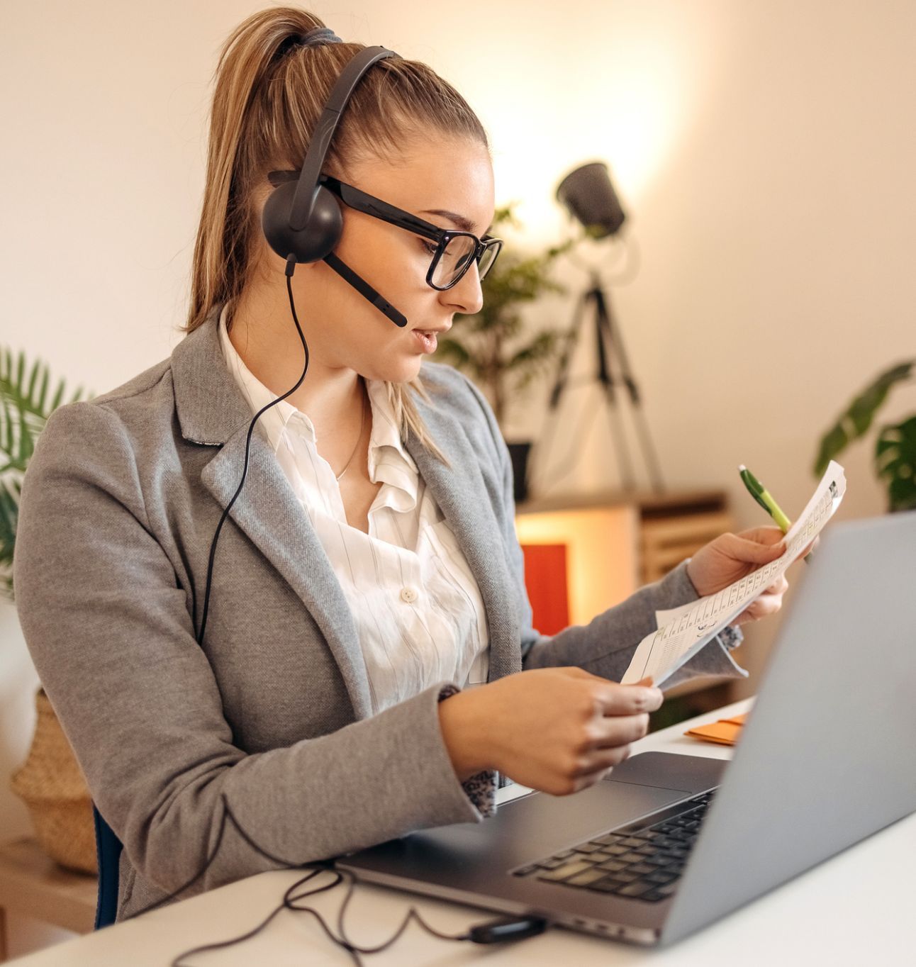 analyst on phone and computer
